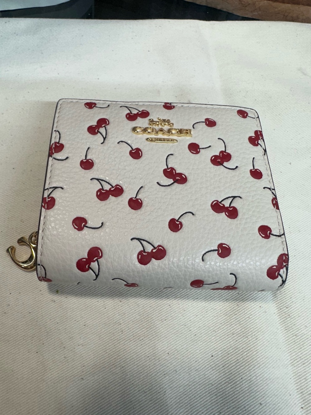 Coach Snap Wallet
With Cherry Print . New